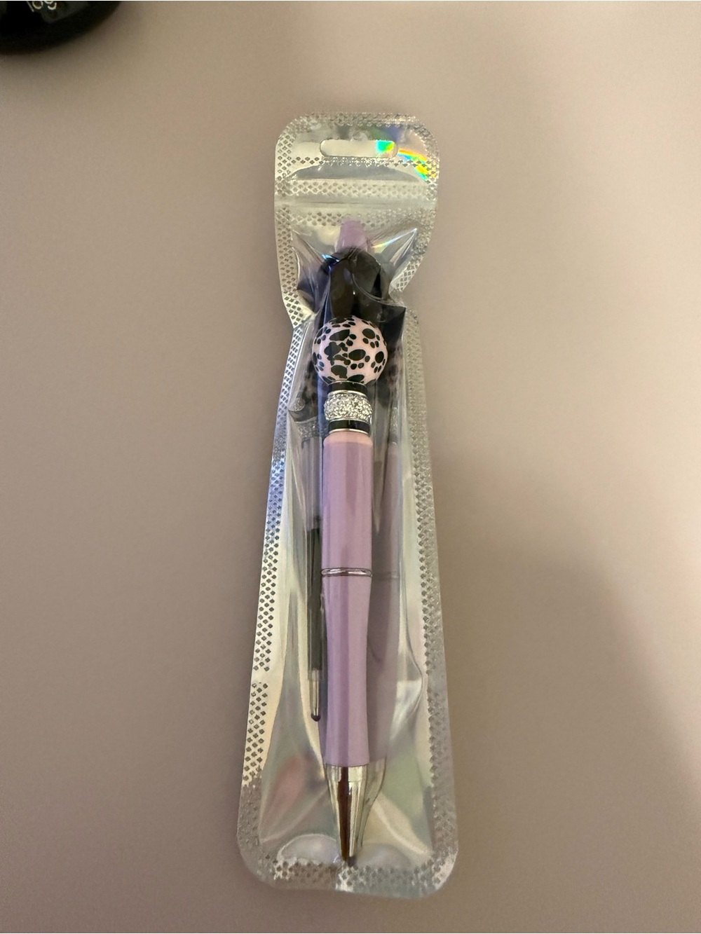 Lavender and black beaded Pen with paw Accent bead